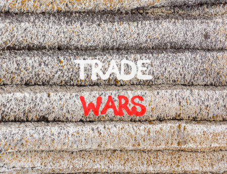 Trade wars symbol. Concept word Trade wars on beautiful gray mountain wall. Beautiful gray mountain wall background. Business trade wars concept. Copy space.の写真素材