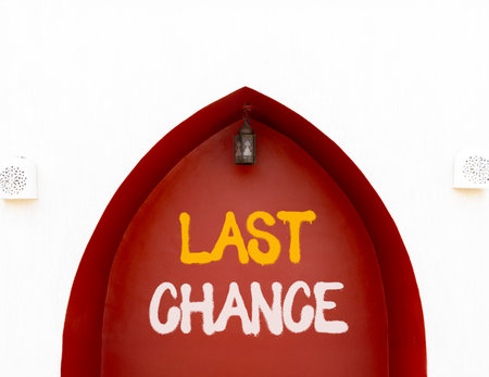 Last chance symbol. Concept word Last chance on beautiful white and red wall. Beautiful white and red wall background. Business last chance concept. Copy space.