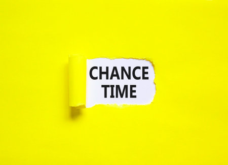 Chance time symbol. Concept word Chance time on beautiful white paper. Beautiful yellow paper background. Business chance time concept. Copy space.の写真素材