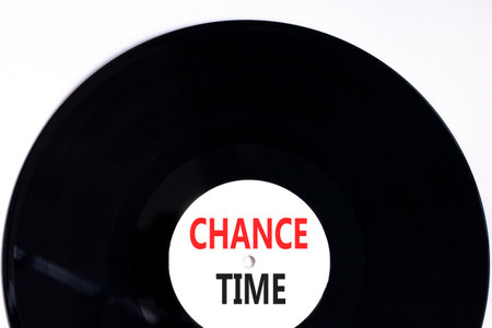Chance time symbol. Concept word Chance time on beautiful black and white vinyl disk. Beautiful white paper background. Business chance time concept. Copy space.の写真素材