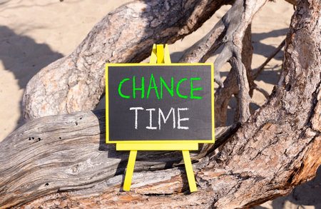 Chance time symbol. Concept word Chance time on beautiful black blackboard. Beautiful old tree background. Black blackboard. Business chance time concept. Copy space.の写真素材