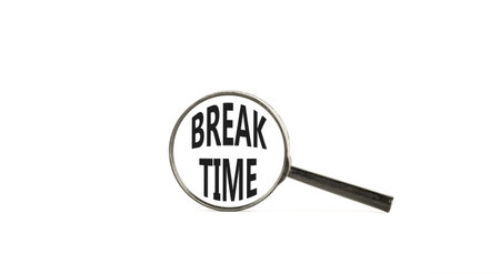 Break time symbol. Concept Break word time on beautiful magnifying glass. Beautiful white paper background. Black magnifying glass. Business break time concept. Copy space.の写真素材
