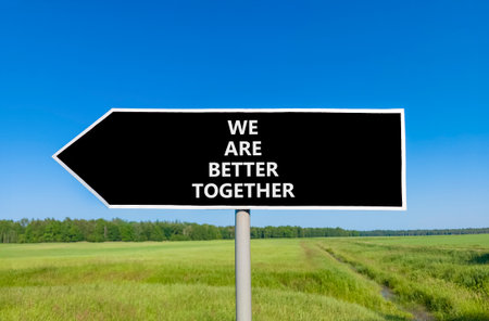 We are better together symbol. Concept words phrase We are better together on beautiful black road...