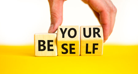 Motivational be yourself symbol. Concept words Be yourself on beautiful wooden block. Beautiful...