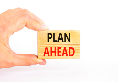 Plan ahead symbol. Concept word Plan ahead on beautiful wooden blocks. Beautiful white paper...