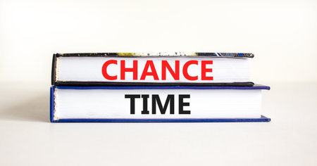 Chance time symbol. Concept word Chance time on beautiful books. Beautiful white paper background. Business chance time concept. Copy space.の写真素材