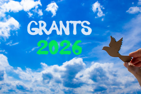 Grants 2026 symbol. Concept words Grants 2026 on beautiful blue sky. Beautiful blue sky background....