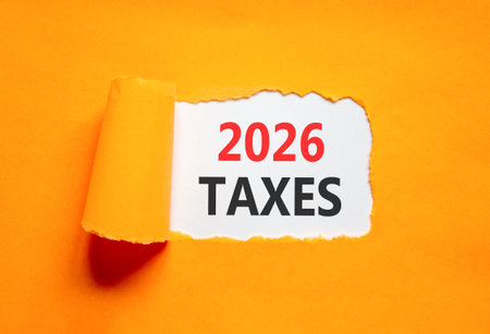 2026 taxes new year symbol. Concept words 2026 taxes on beautiful white paper. Beautiful orange...