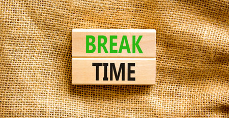 Break time symbol. Concept Break word time on beautiful wooden blocks. Beautiful canvas background. Business break time concept. Copy space.の写真素材