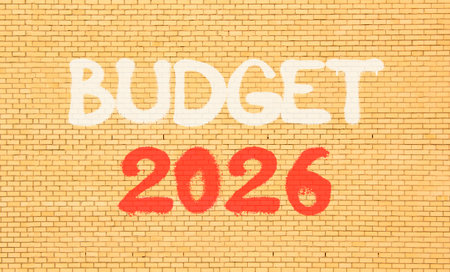 Budget 2026 symbol. Concept words Budget 2026 on beautiful old brown brick wall. Beautiful old brown...