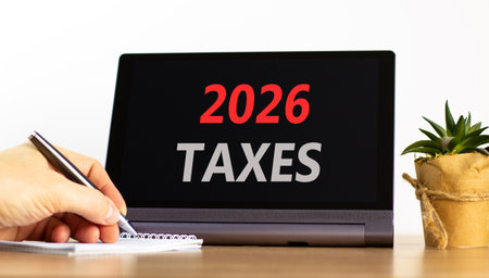2026 taxes new year symbol. Concept words 2026 taxes on beautiful black tablet screen. Beautiful...