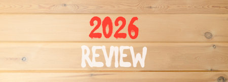2026 Review symbol. Concept words 2026 Review on beautiful wooden wall. Beautiful wooden wall background. Business and 2026 review concept. Copy space.の写真素材