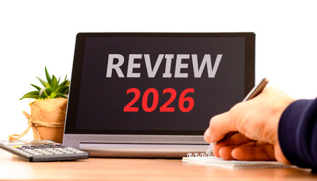 Review 2026 symbol. Concept words Review 2026 on beautiful black tablet screen. Beautiful white...