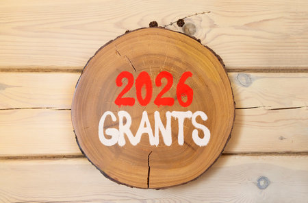 2026 Grants symbol. Concept words 2026 Grants on beautiful wooden circle. Beautiful wooden wall...