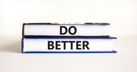 Do better symbol. Concept words Do better on beautiful books. Beautiful white background. Business and do better concept. Copy space.の写真素材