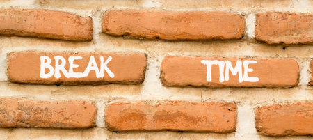 Break time symbol. Concept Break word time on beautiful old brown brick wall. Beautiful old brown...