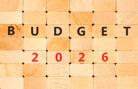 Budget 2026 symbol. Concept words Budget 2026 on beautiful wooden blocks wall. Beautiful wooden blocks wall background. Business and budget 2026 concept. Copy space.の写真素材