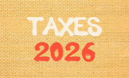 Taxes 2026 new year symbol. Concept words Taxes 2026 on beautiful old brown brick wall. Beautiful old brown brick wall background. Business and taxes 2026 new year concept. Copy space.の写真素材