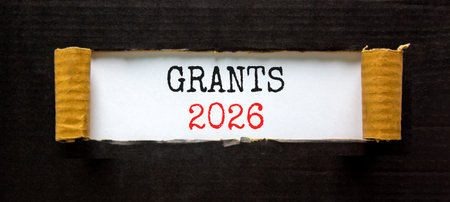 Grants 2026 symbol. Concept words Grants 2026 on beautiful white paper. Beautiful black paper...