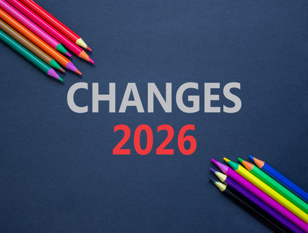 Changes 2026 symbol. Concept words Changes 2026 on beautiful black paper. Beautiful black paper background. Beautiful colored pencils. Business and changes 2026 concept. Copy space.の写真素材