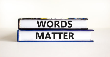 Words matter symbol. Concept word Words matter on beautiful books. Beautiful white paper background....