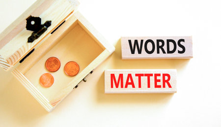 Words matter symbol. Concept word Words matter on beautiful wooden blocks. Beautiful white paper...