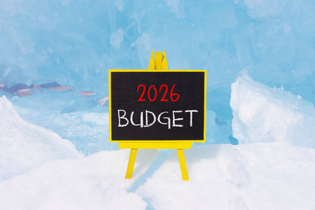 2026 Budget symbol. Concept words 2026 Budget on beautiful black blackboard. Beautiful blue lake Baikal ice background. Business and 2026 budget concept. Copy space.の写真素材