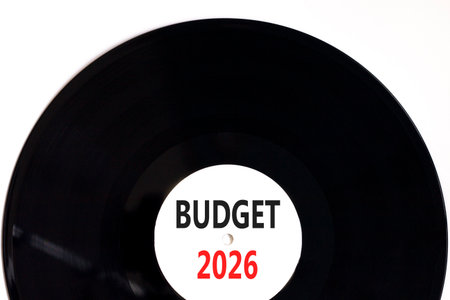 Budget 2026 symbol. Concept words Budget 2026 on beautiful white and black vinyl disk. Beautiful white paper background. Business and budget 2026 concept. Copy space.の写真素材