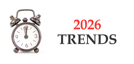 2026 Trends new year symbol. Concept words 2026 Trends on beautiful white paper. Beautiful white paper background. Beautiful black alarm clock. Business and 2026 Trends new year concept. Copy space.の写真素材