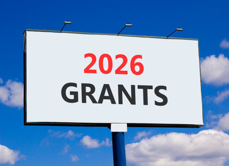 2026 Grants symbol. Concept words 2026 Grants on beautiful big white billboard. Beautiful blue sky and clouds background. Business and 2026 grants concept. Copy space.の写真素材