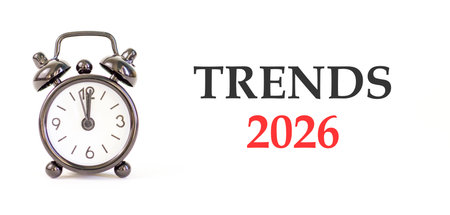 Trends 2026 new year symbol. Concept words Trends 2026 on beautiful white paper. Beautiful white paper background. Beautiful black alarm clock. Business and Trends 2026 new year concept. Copy space.の写真素材