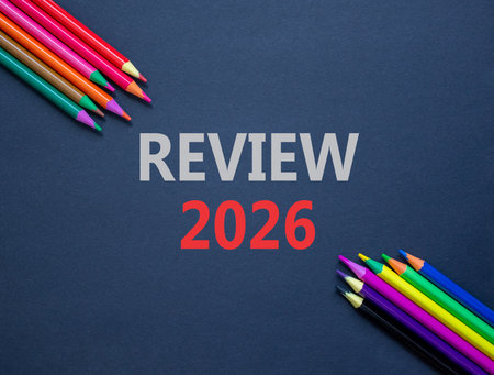Review 2026 symbol. Concept words Review 2026 on beautiful black paper. Beautiful black paper...