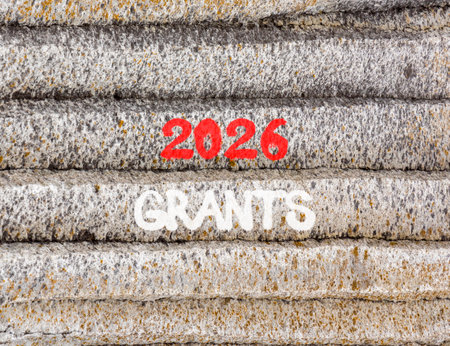 2026 Grants symbol. Concept words 2026 Grants on beautiful gray mountain wall. Beautiful gray mountain wall background. Business and 2026 grants concept. Copy space.の写真素材