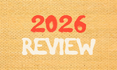 2026 Review symbol. Concept words 2026 Review on beautiful old brown brick wall. Beautiful old brown brick wall background. Business and 2026 review concept. Copy space.の写真素材