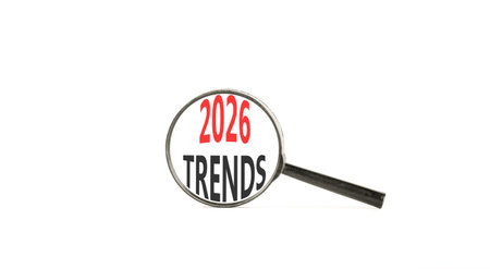 2026 Trends new year symbol. Concept words 2026 Trends on beautiful white paper. Black magnifying...