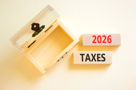 2026 taxes new year symbol. Concept words 2026 taxes on beautiful wooden blocks. Beautiful white...