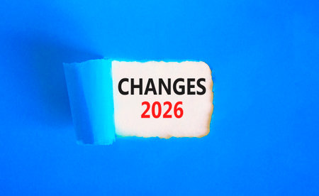Changes 2026 symbol. Concept words Changes 2026 on beautiful white paper. Beautiful blue paper background. Business and changes 2026 concept. Copy space.の写真素材
