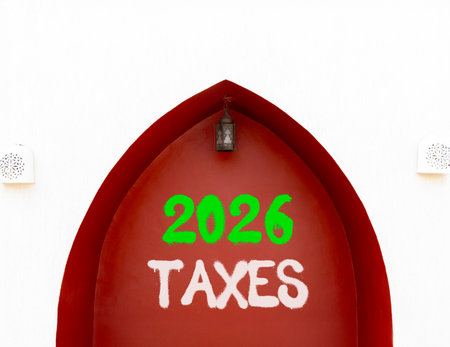 2026 taxes new year symbol. Concept words 2026 taxes on beautiful white and red wall. Beautiful white and red wall background. Business and 2026 taxes new year concept. Copy space.の写真素材