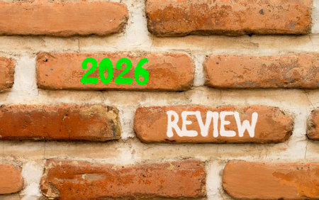 2026 Review symbol. Concept words 2026 Review on beautiful brown brick wall. Beautiful brown brick...