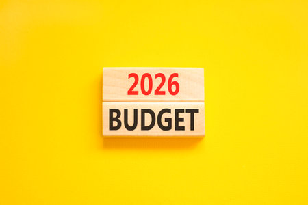 2026 Budget symbol. Concept words 2026 Budget on beautiful wooden blocks. Beautiful yellow paper...