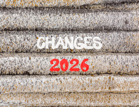 Changes 2026 symbol. Concept words Changes 2026 on beautiful gray mountain wall. Beautiful gray...
