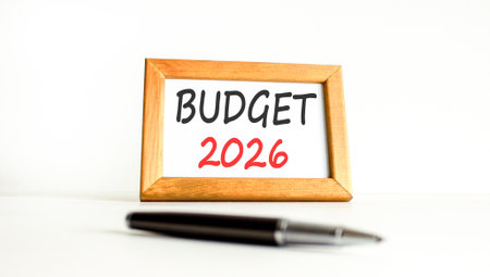 Budget 2026 symbol. Concept words Budget 2026 on beautiful wooden picture frame. Beautiful white...