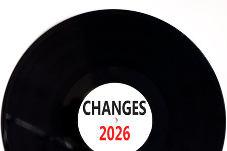 Changes 2026 symbol. Concept words Changes 2026 on beautiful white and black vinyl disk. Beautiful...