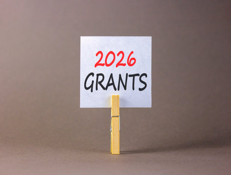 2026 Grants symbol. Concept words 2026 Grants on beautiful white paper on wooden clothespin....
