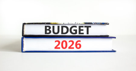 Budget 2026 symbol. Concept words Budget 2026 on beautiful books. Beautiful white paper background....