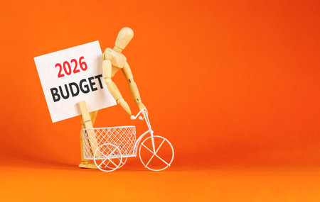 2026 Budget symbol. Concept words 2026 Budget on beautiful white card. Beautiful orange paper background. Businessman's model. Business and 2026 budget concept. Copy space.の写真素材