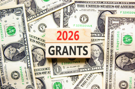 2026 Grants symbol. Concept words 2026 Grants on beautiful wooden blocks. Beautiful dollar bills...