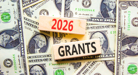 2026 Grants symbol. Concept words 2026 Grants on beautiful wooden blocks. Beautiful dollar bills...