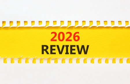2026 Review symbol. Concept words 2026 Review on beautiful yellow paper. Beautiful white paper...