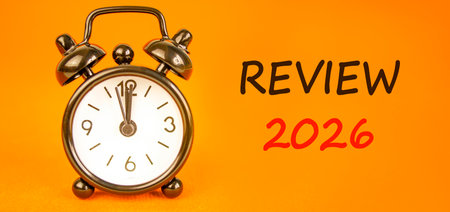 Review 2026 symbol. Concept words Review 2026 on beautiful orange paper. Beautiful orange paper...